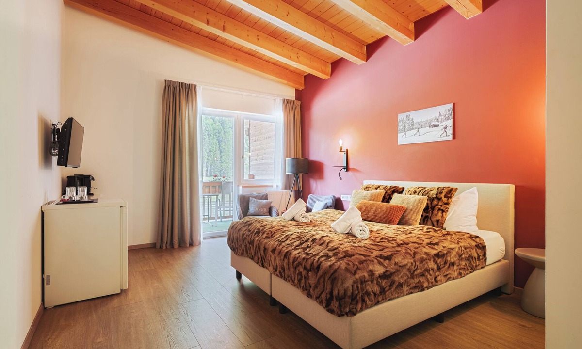Leutasch Hotel | Mountain View Deluxe: enjoy mountain views together, a balcony, and alpine luxury. Perfect for a romantic stay in summer or winter.
