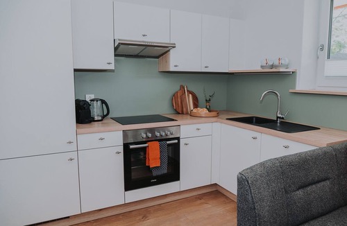 Sankt Michael im Lungau Apartment | Familienlodge Berger – apartment Bergalm with garden, Stube, and three private bathrooms