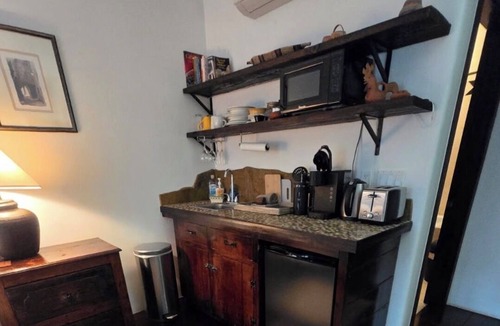 Downtown Santa Fe Apartment | Luxurious and sanitized Studio, original adobe walls, wood floor, real sanctuary