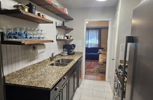Euless House | Peaceful 4-bdrm HomeAway Texas Rose Euless with covered patio and fenced yard.