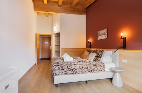 Leutasch Hotel | The Leutasch Retreat Comfort room offers peace, style, and comfort after hiking, cycling, or winter sports in the Alps around Seefeld.