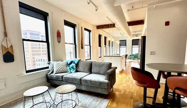 A historic beautifully detailed suite, 1,300 square foot, corner loft in the heart of the Old Market in Omaha