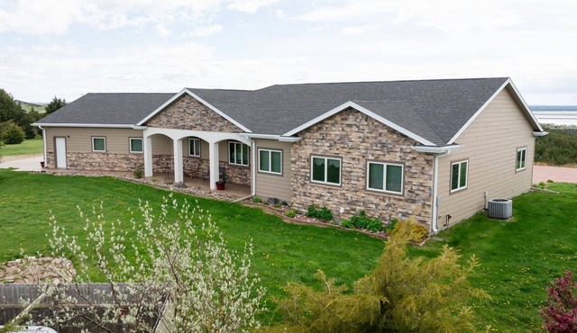 Location Location Location! On a river view acreage, sleeps up to 14, pets ok. in Chamberlain