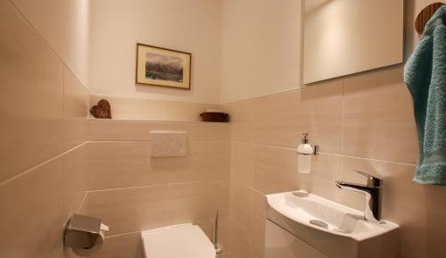 Two-Bedroom Apartment with balcony and mountain view (2 Adults and 2 Children)