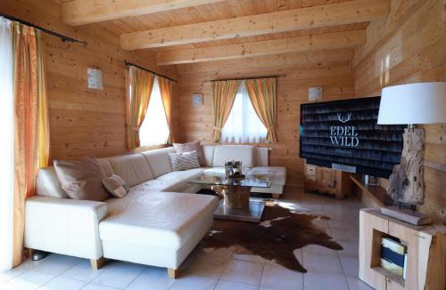Frantschach-Sankt Gertraud Ski Chalet | EDELWILD Almchalet - DIE KORALPEN RESIDENZ im Koralm Dorf I Luxus Chalet 144 qm I Sauna I Garten I Gartenmöbel I Weber Grill I Bang & Olufsen TV I WMF Küchengeräte I Panoramasicht I 4 Parkplätze