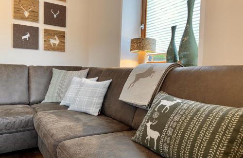 Seeboden Apartment | EulenNest - Ferienhaus in Seeboden am Millstätter See mit Bergblick & Sauna