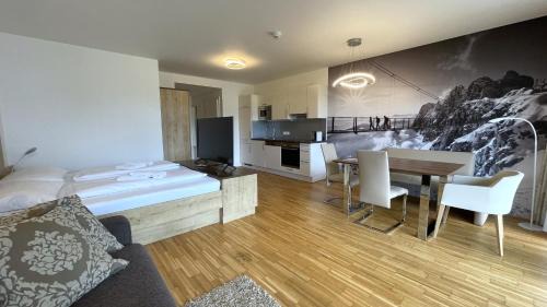 Haus im Ennstal Apartment | Apartmány ALPINE LIVING Haus - Schladming
