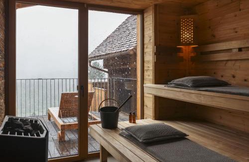 Deutschlandsberg Villa | Am Wildbachberg - Luxus Ferienhäuser mit Infinitypool, Privatsauna und Weinkeller