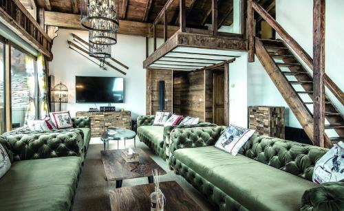 Mittelberg Ski Chalet | There are several terraces and a large garden