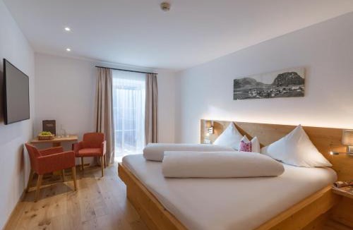 Walchsee Hotel | Postgasthof Fischerwirt
