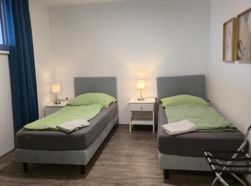 Wolfsjäger Worker Rooms - voll ausgestattete Gemeinschafts-Apartments mit Küche & Waschmaschine, nahe Linz in Engerwitzdorf